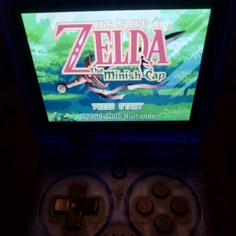 anbernic rg35xxsp blue transparent loaded with most retro platforms 256gb silic
